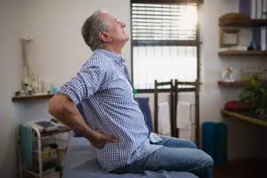 Senior suffering from hip pain
