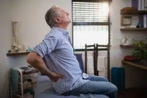 Senior suffering from hip pain