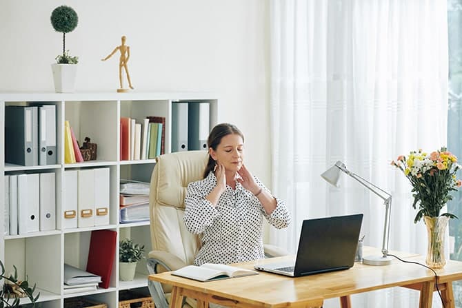 Woman relaxing after using laptop in Houston,Tx