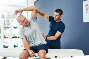 Chiropractor is doing some chiropractic Assessment to the patient