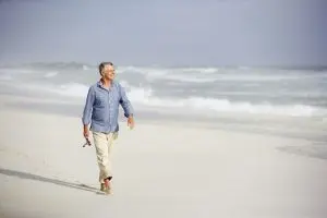 The old man walking on the beach at Houston, TX