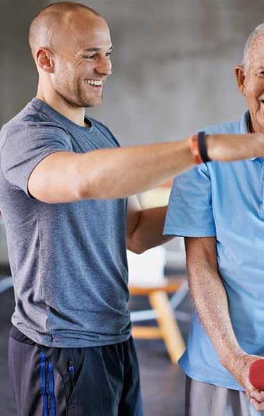 Chiropractor doing Soft Tissue Treatment session to the senior
