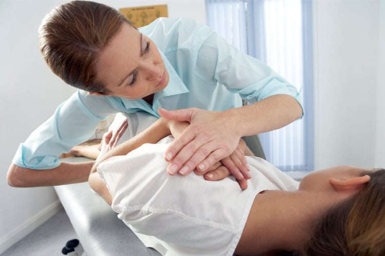 Chiropractor doing some chiropractic adjustment to the patient