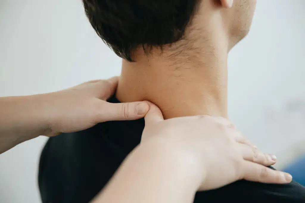Patients Neck Massaged by a Physiotherapist